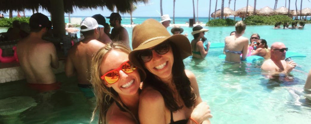 Frankie and Amber in the tropics celebrating their relationship and showing off their unique engagement rings designed by Sofia Kaman.
