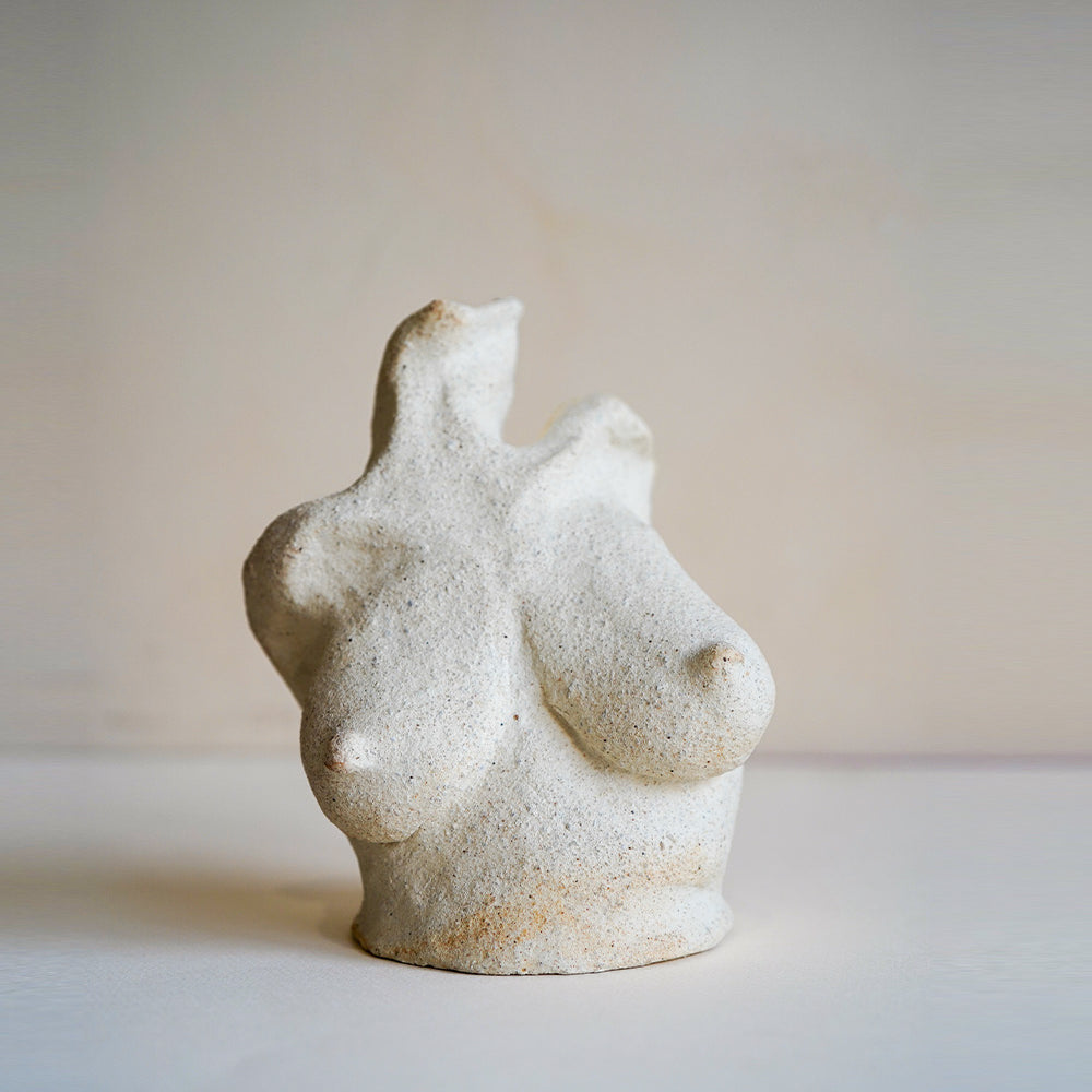 Petite Minimal Bud Vase RM-MINI-2 small beige speckled stone bud vase with sculpted form on light background
