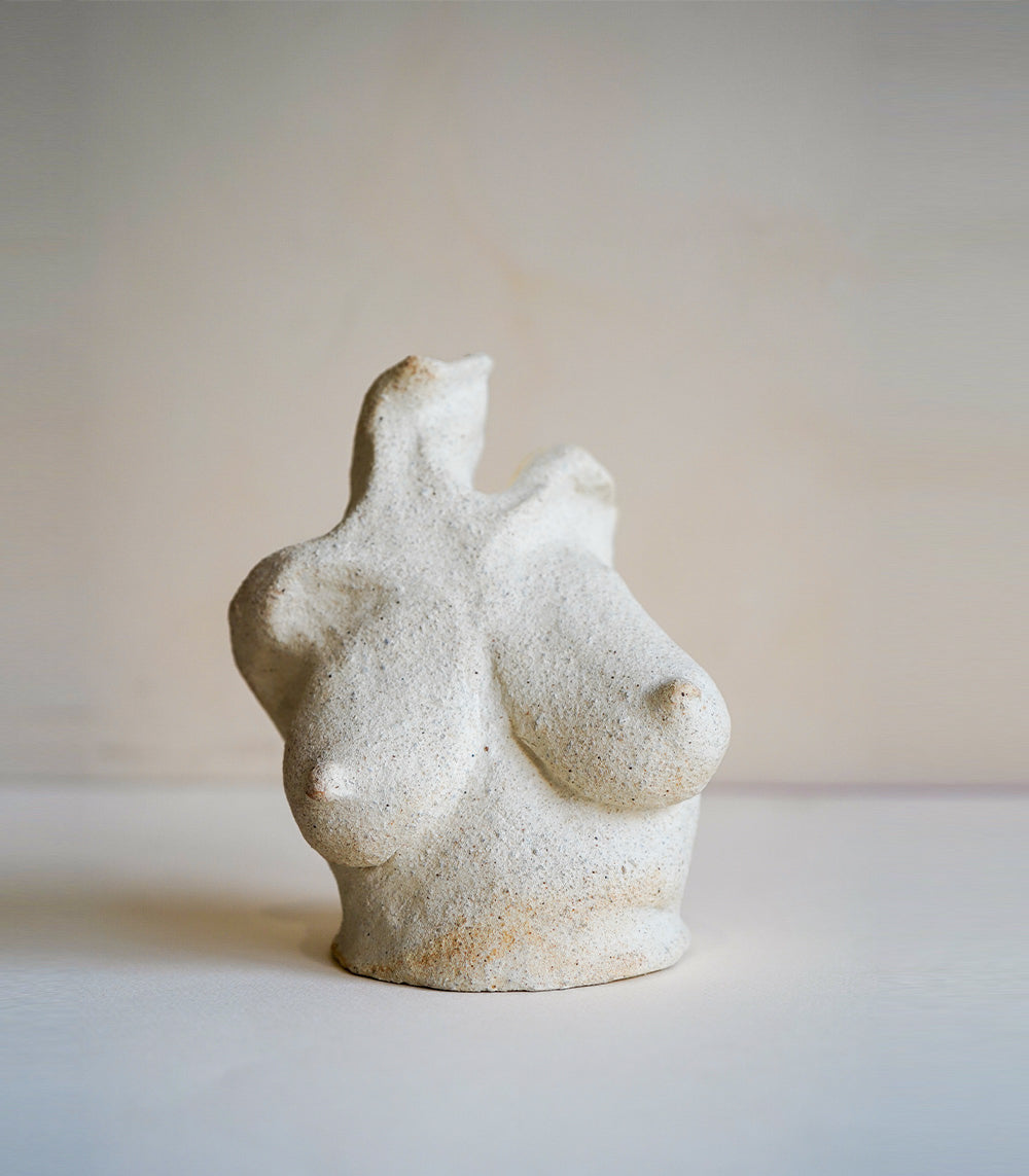 Petite Minimal Bud Vase RM-MINI-2 small beige speckled stone bud vase with sculpted form on light background
