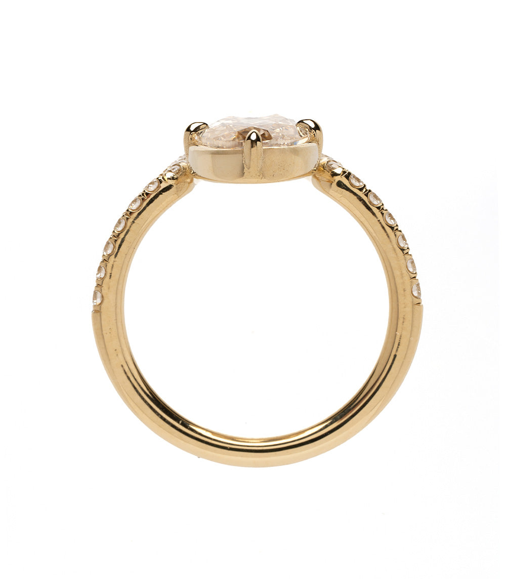 Aura SK-R120-CD-EOB-2.75 gold engagement ring with oval clear center stone and small side stones