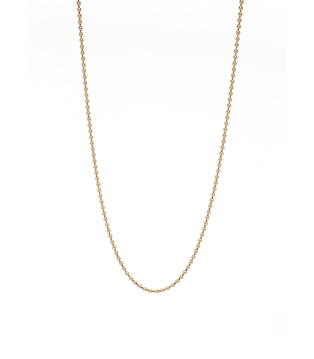 The Mod CN-C6 gold beaded ball chain necklace with evenly spaced round links on a plain background