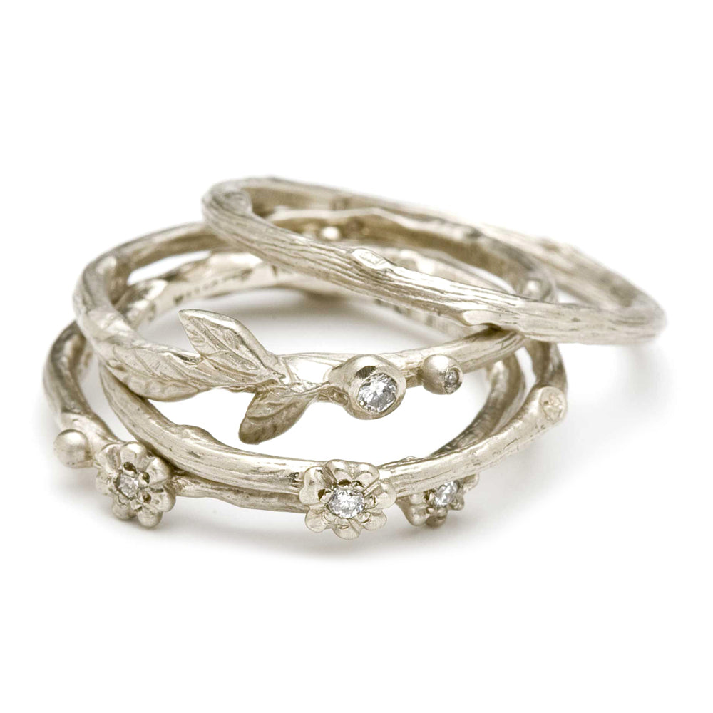 Twig Band by ES-R3 in 14K white gold, shiny twig motif with small round stones for an understated look bright studio light