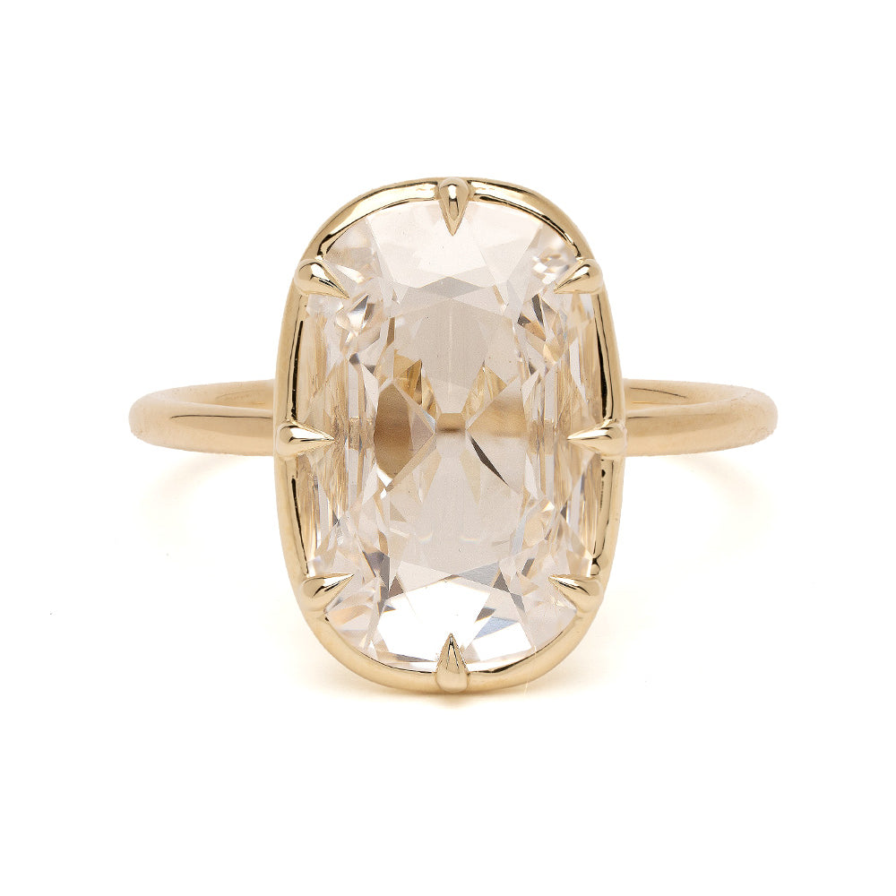 Gigi by Sofia Kaman understated unique engagement ring with lab grown diamond center in yellow gold