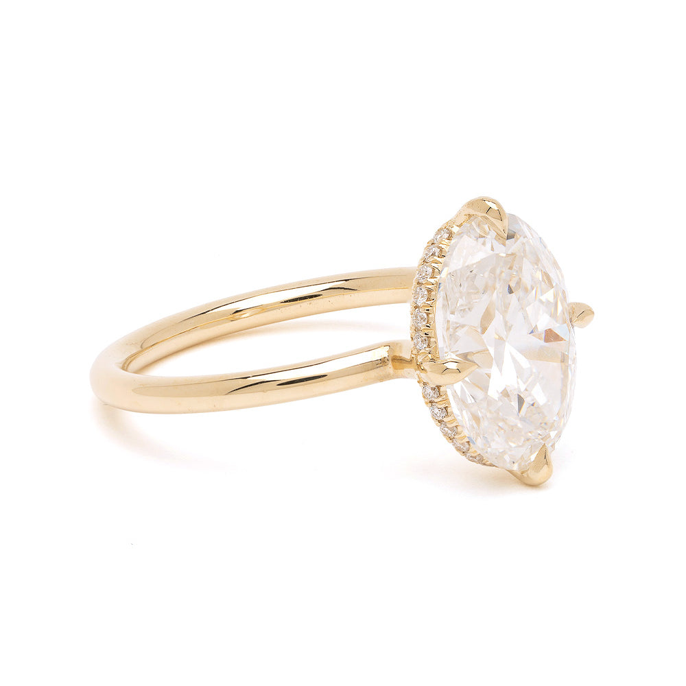 Billie by Sofia Kaman engagement ring in yellow gold with round clear diamond center and halo details