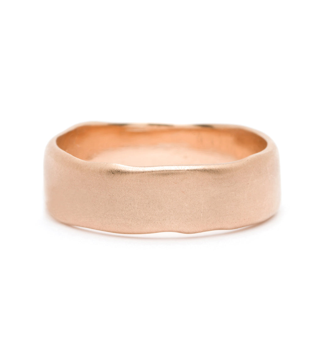 Torn Paper Wedding Band by M-R4-7 in matte 14K rose gold with a torn paper texture.