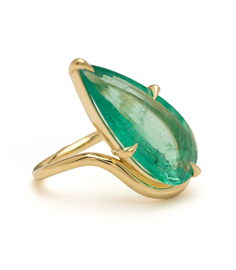 Aura Sofia Kaman ring in green marquise gemstone with gold bezel setting and polished slender band