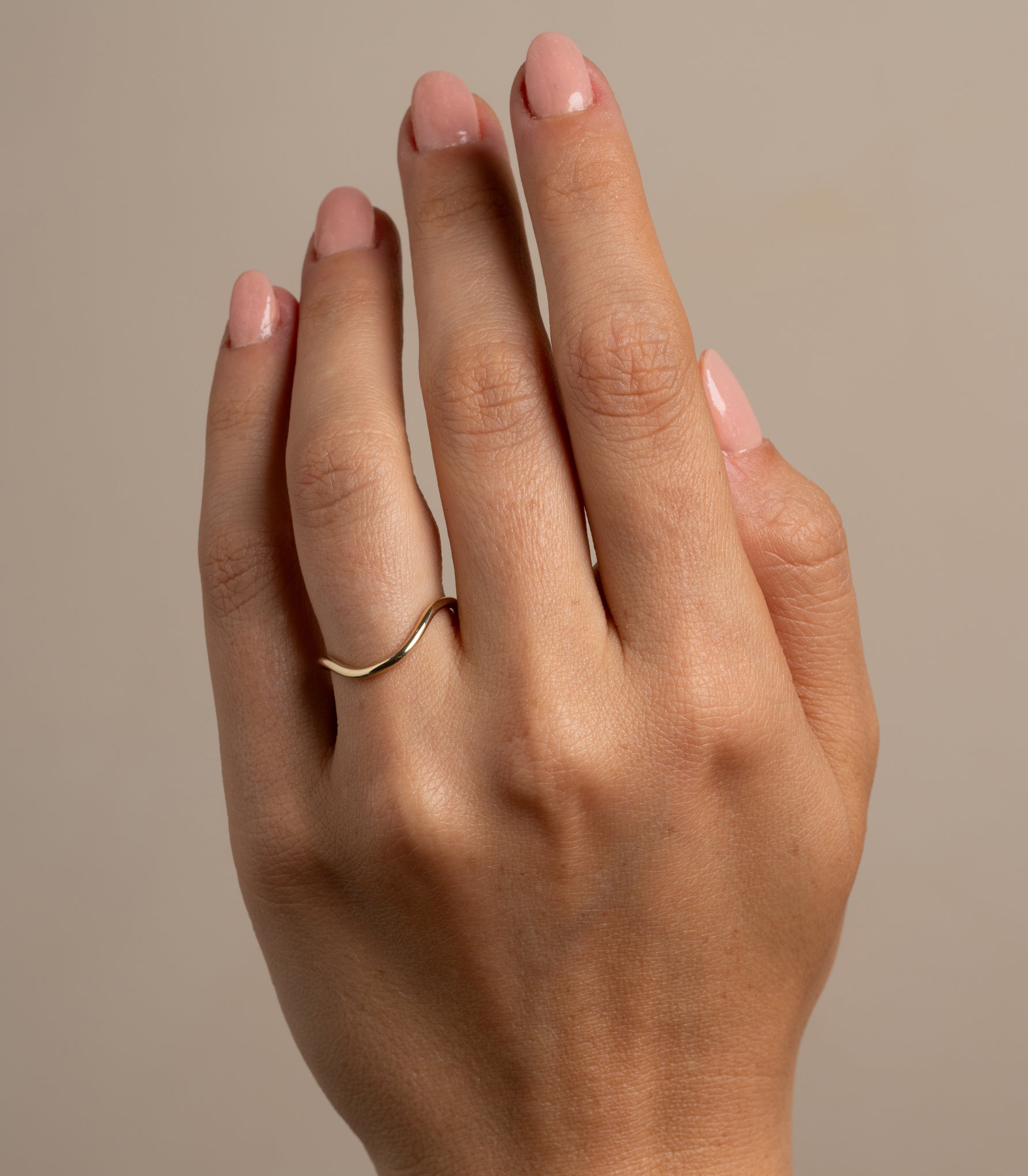 Beau Band A-R41 engagement ring band in 14k yellow gold with smooth shiny finish on finger