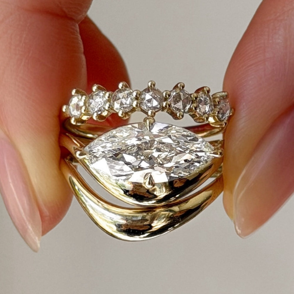 Melt Solitaire unique engagement ring by Sofia Kaman asymmetrical engagement ring in gold with bright marquise center
