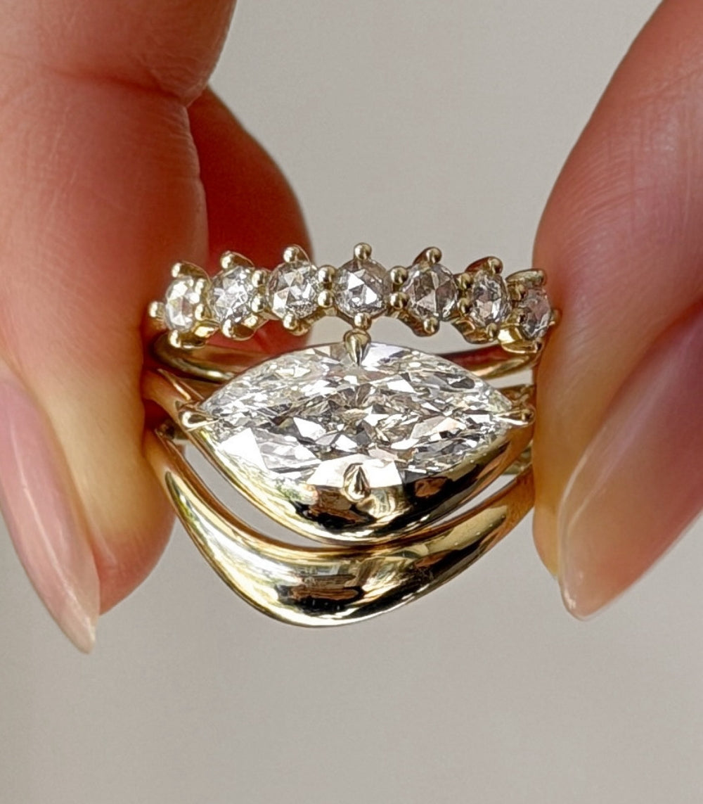 Melt Solitaire unique engagement ring by Sofia Kaman asymmetrical engagement ring in gold with bright marquise center