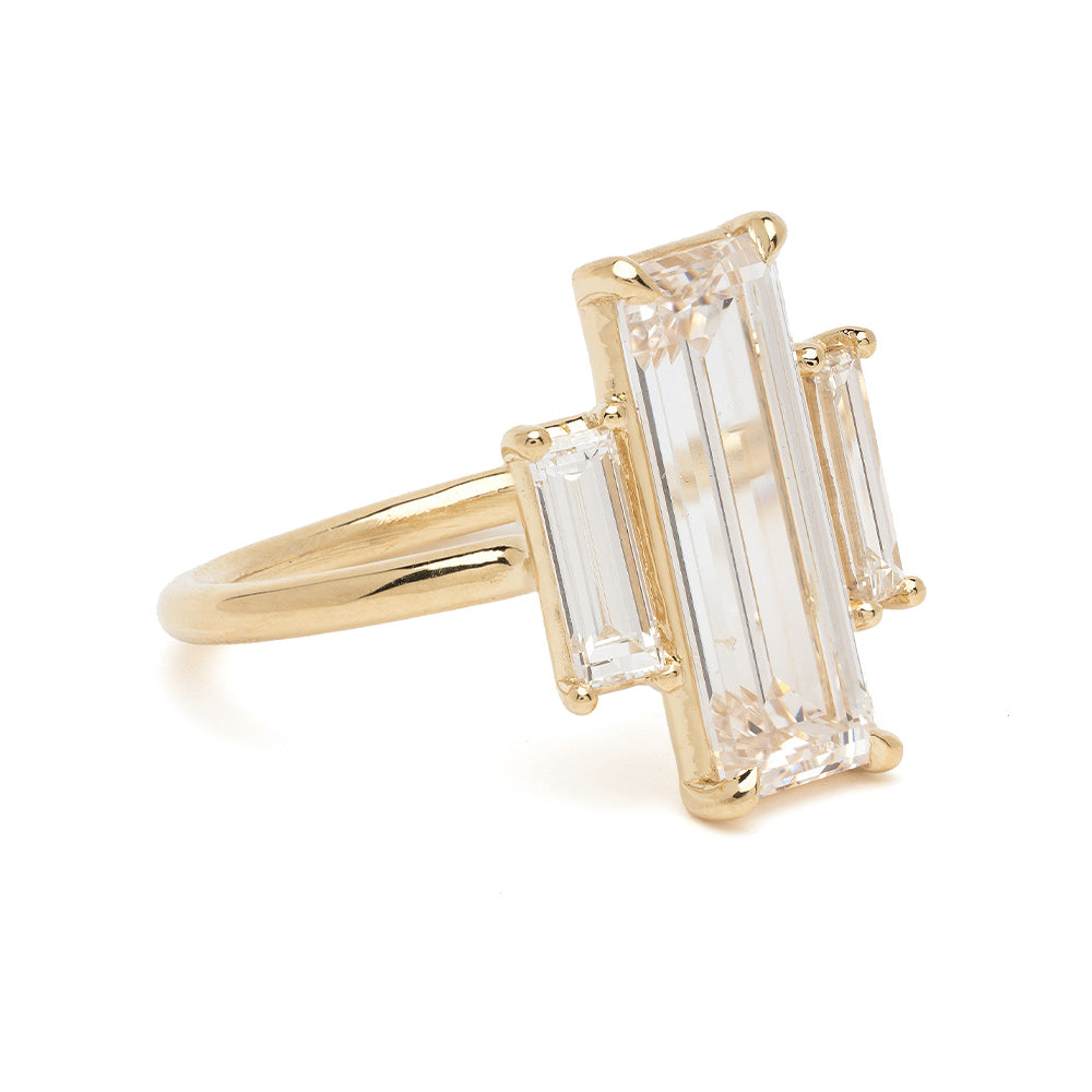 Lottie SK-R124-LGD-NS-BG-3.23 gold ring with baguette-cut clear stone in prong setting