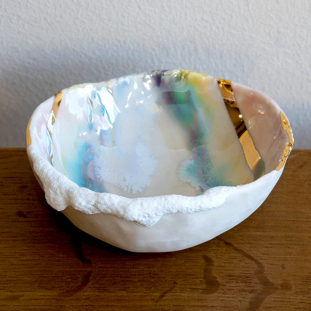 Mini Prism Ring Dish G-004 in white with iridescent prism interior and gold accents on wood table