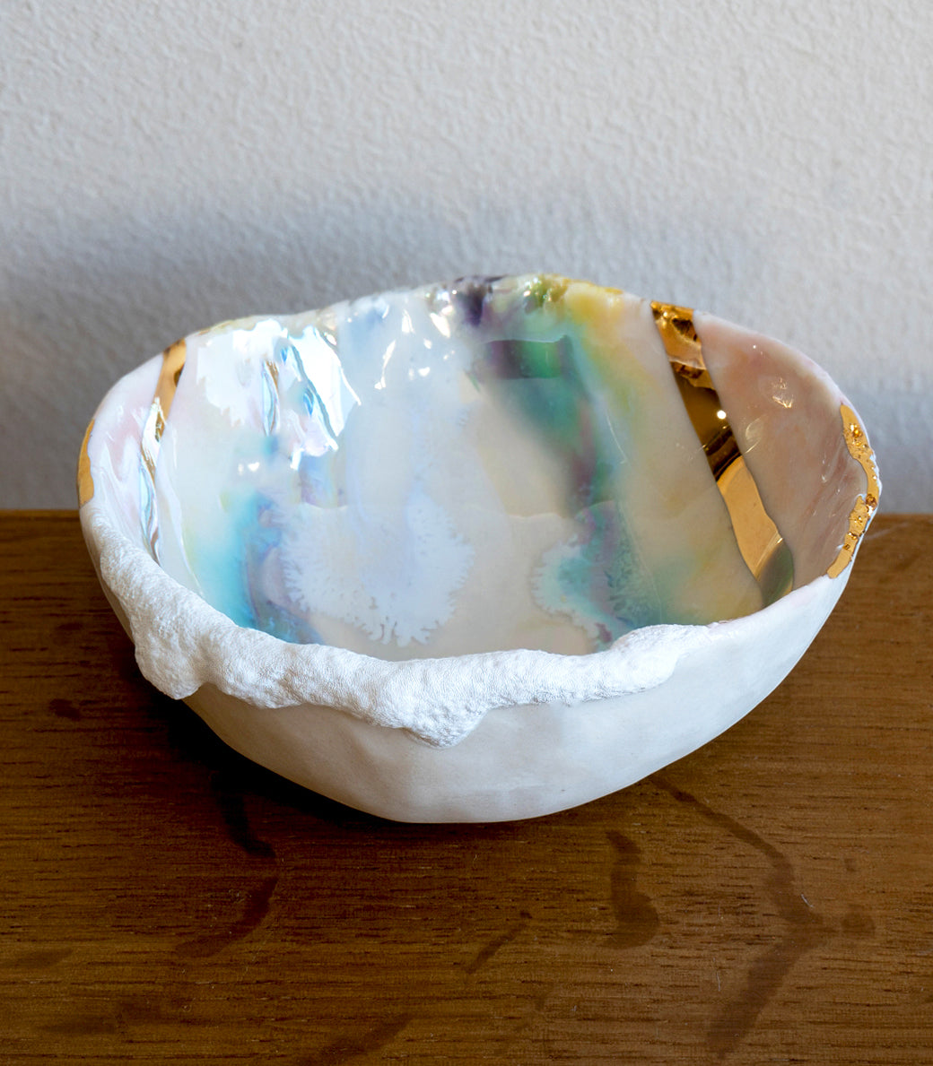 Mini Prism Ring Dish G-004 in white with iridescent prism interior and gold accents on wood table