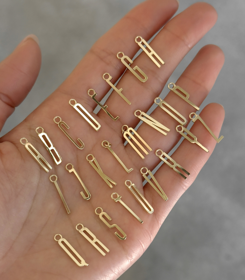 ID NECKLACE NO.1 by ID-N1 gold pendant letters on hand, minimal bar-style necklace charm set