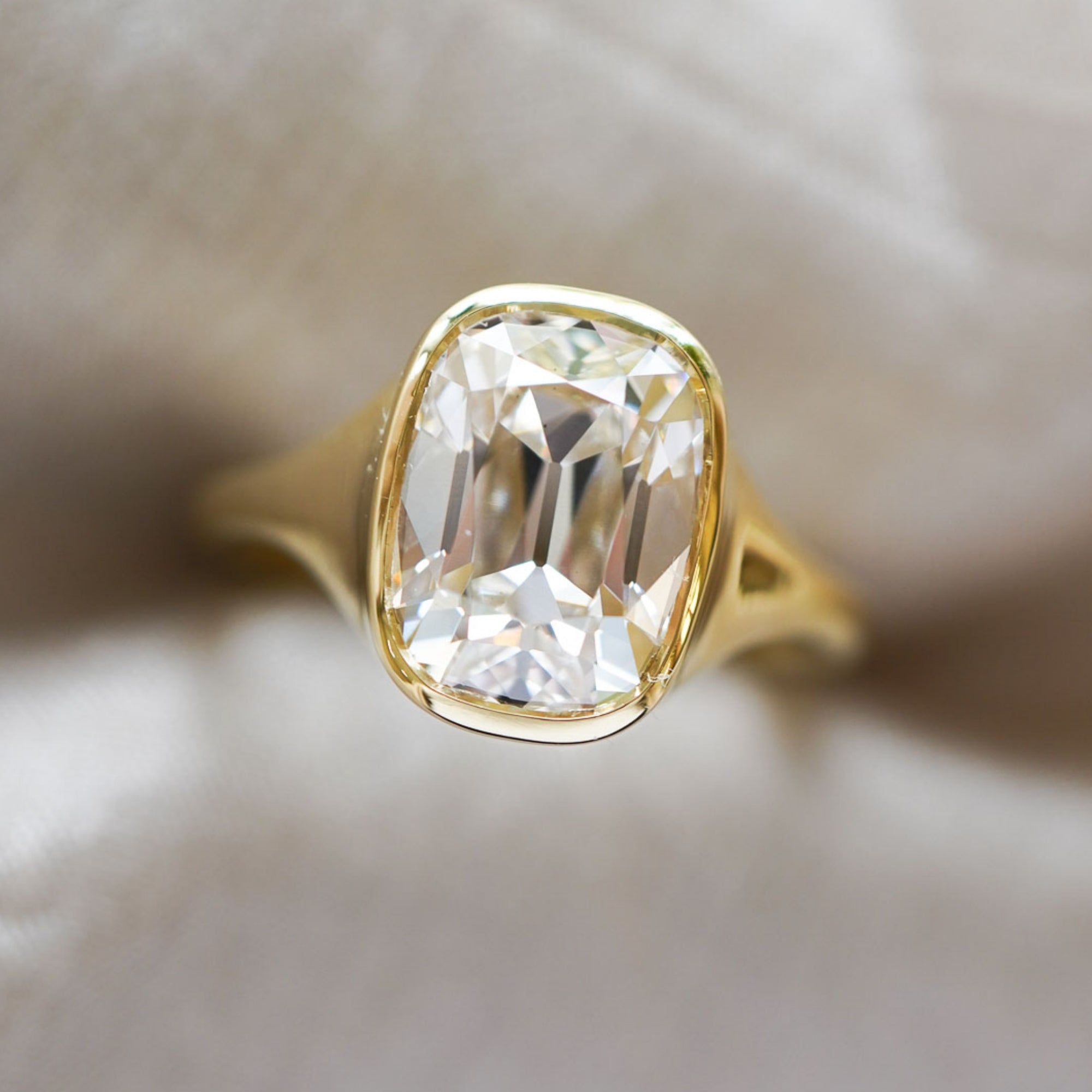 Isolde SK-R121-LGD-OMC-3.78 gold diamond ring with oval center stone, close-up sparkle on soft background