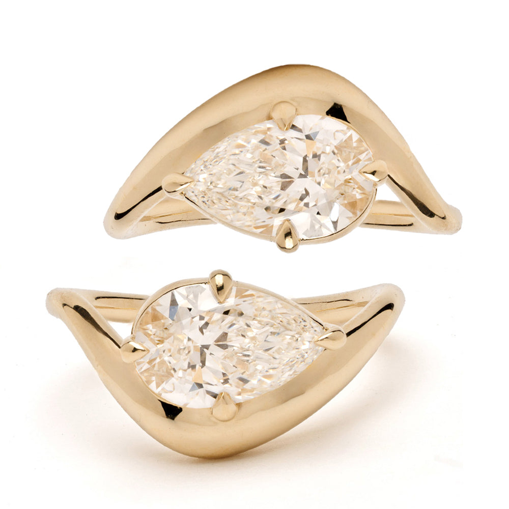Melt Pinky Duo SK-R122-DUO two-stone rings in rose gold with pear-shaped diamond-look stones on a white background