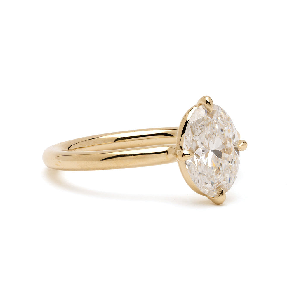 Billie Pinky Duo by SK-R94-DUO, gold round-cut solitaire ring with prong-set sparkle on white background