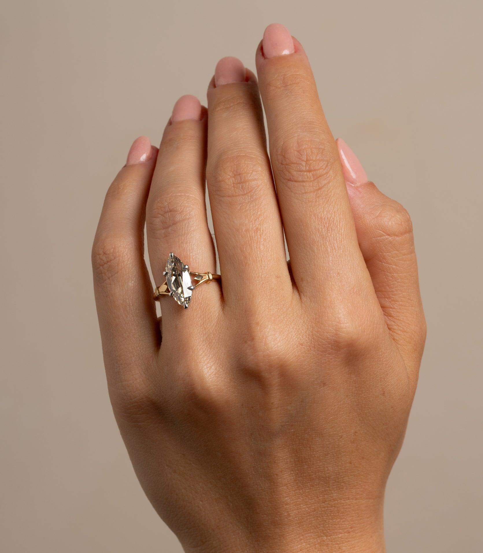 Bad Romance SK-R64-2.56 engagement ring in gold with unique engagement ring center diamond on hand
