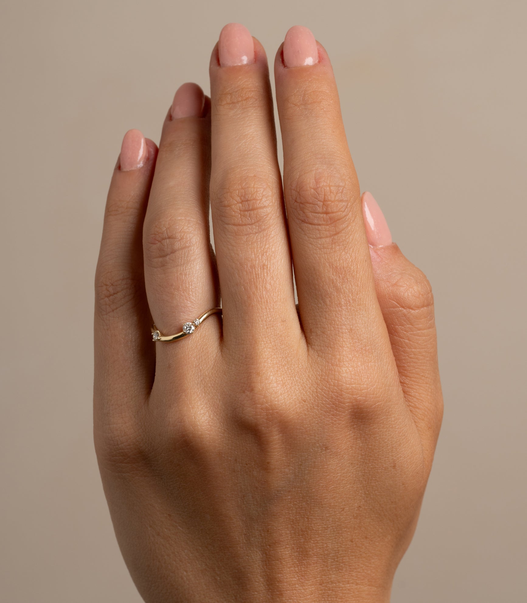 Beau Band with Scattered Diamonds A-R41-3S ring band in shiny yellow gold with scattered diamonds on finger