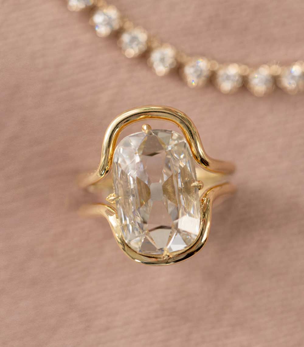 Onda Convertible by Sofia Kaman unique engagement ring in gold with oval lab grown diamond sparkle