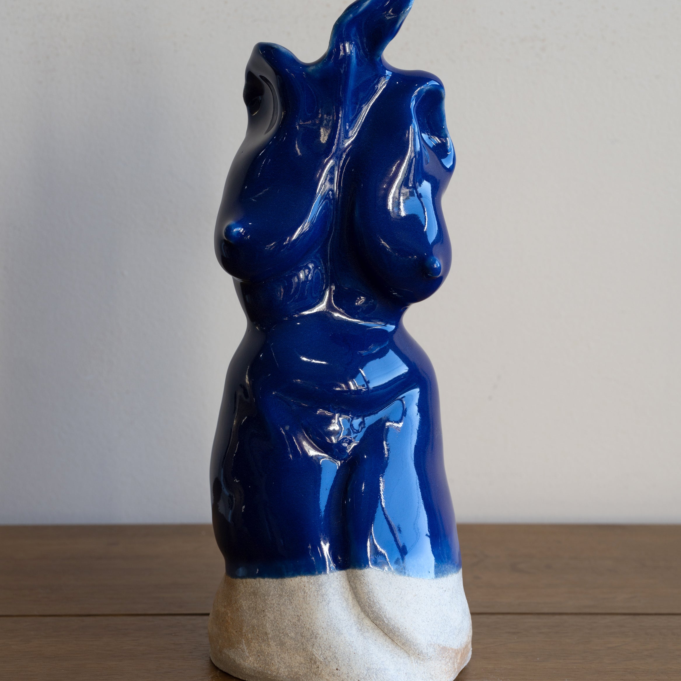 Glazed Sculpture II by RM-005 blue glazed ceramic sculpture with glossy finish on stone base