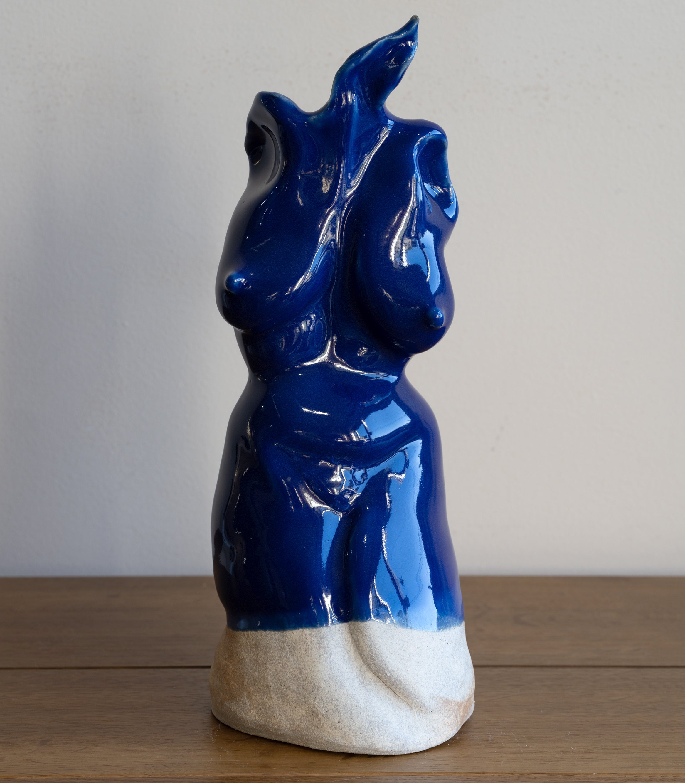 Glazed Sculpture II by RM-005 blue glazed ceramic sculpture with glossy finish on stone base