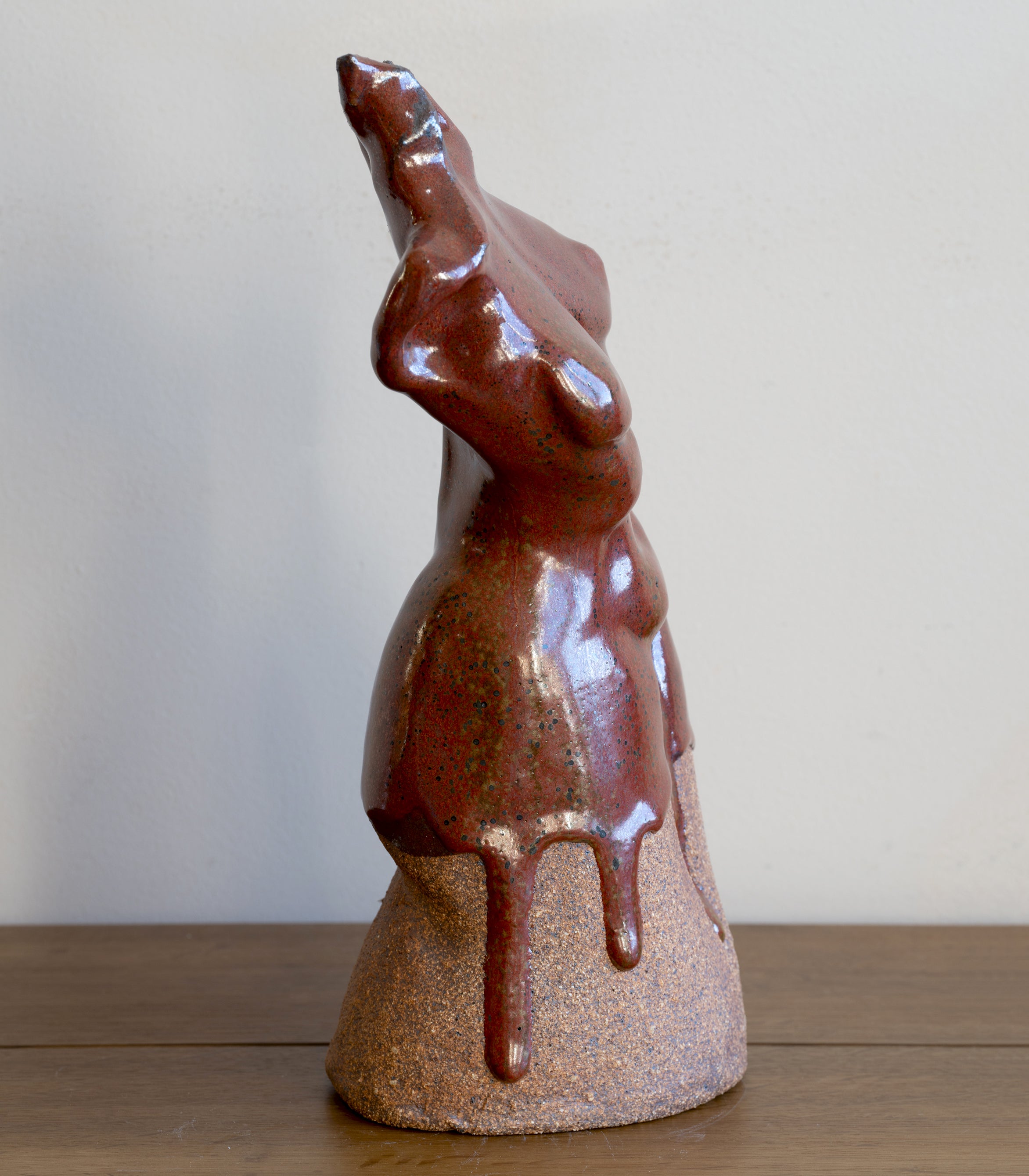 Glazed Sculpture III by RM-005 glazed terracotta ceramic figurine with glossy red-brown finish