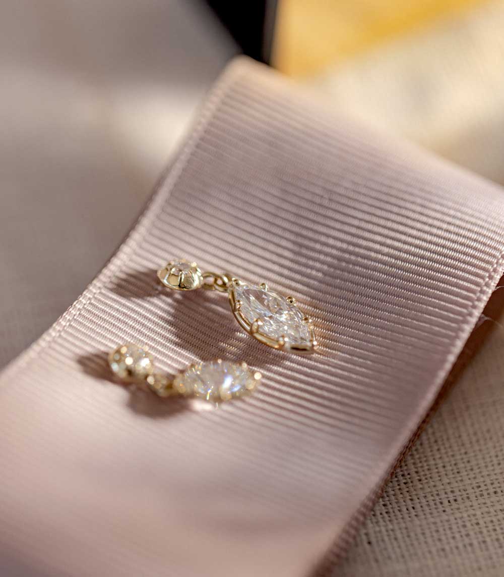 Gigi Earrings by SK-E117-LGD-MB-1.00 in gold with clear oval stones and delicate prong setting