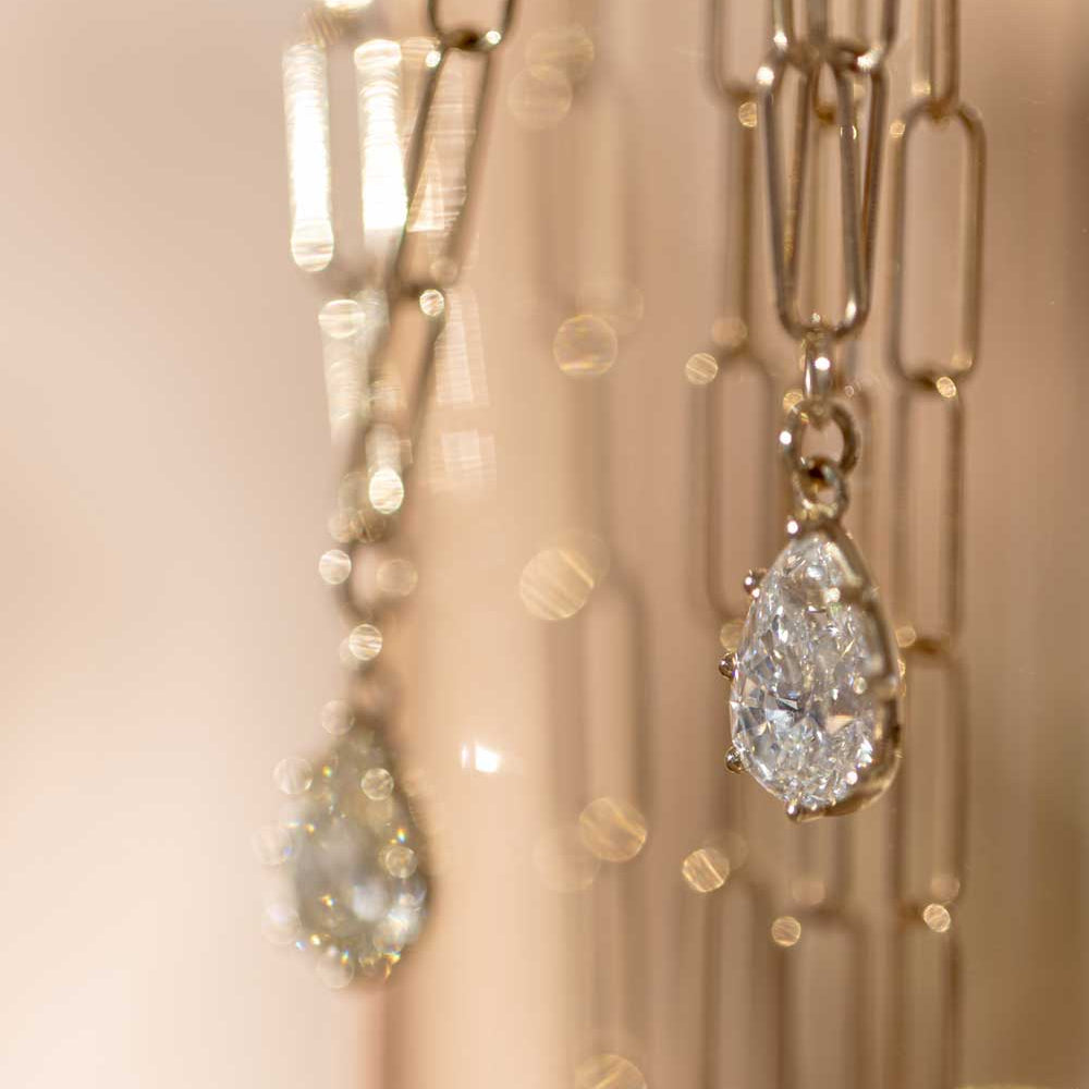 Layering Gigi Necklace by Sofia Kaman in warm gold with teardrop diamond pendant, layered sparkle.