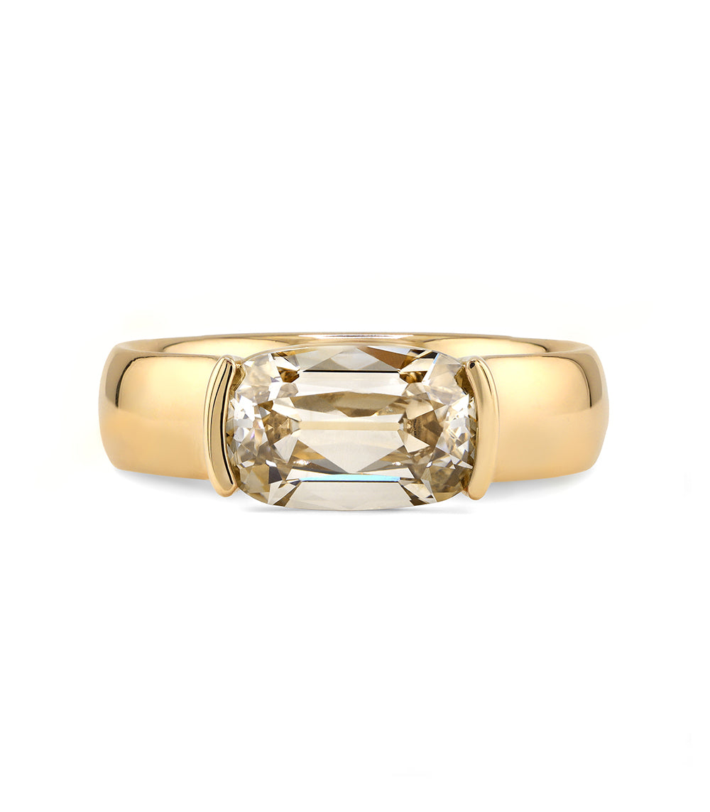 old mine cut elongated cushion champagne lab diamond ring set east west in a half bezel with a thick 14K yellow gold band 