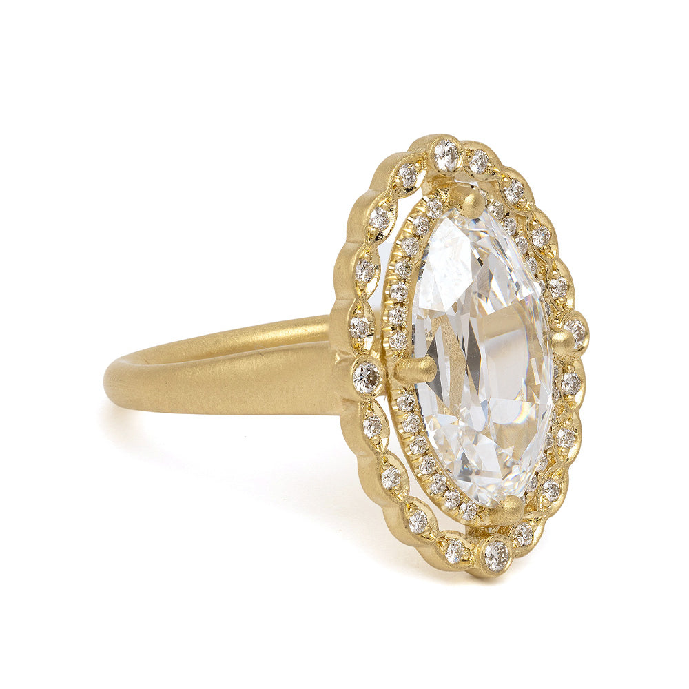 Genevieve SK-R20-LGD-MC-3.56 unique engagement ring in yellow gold with diamond halo and oval center