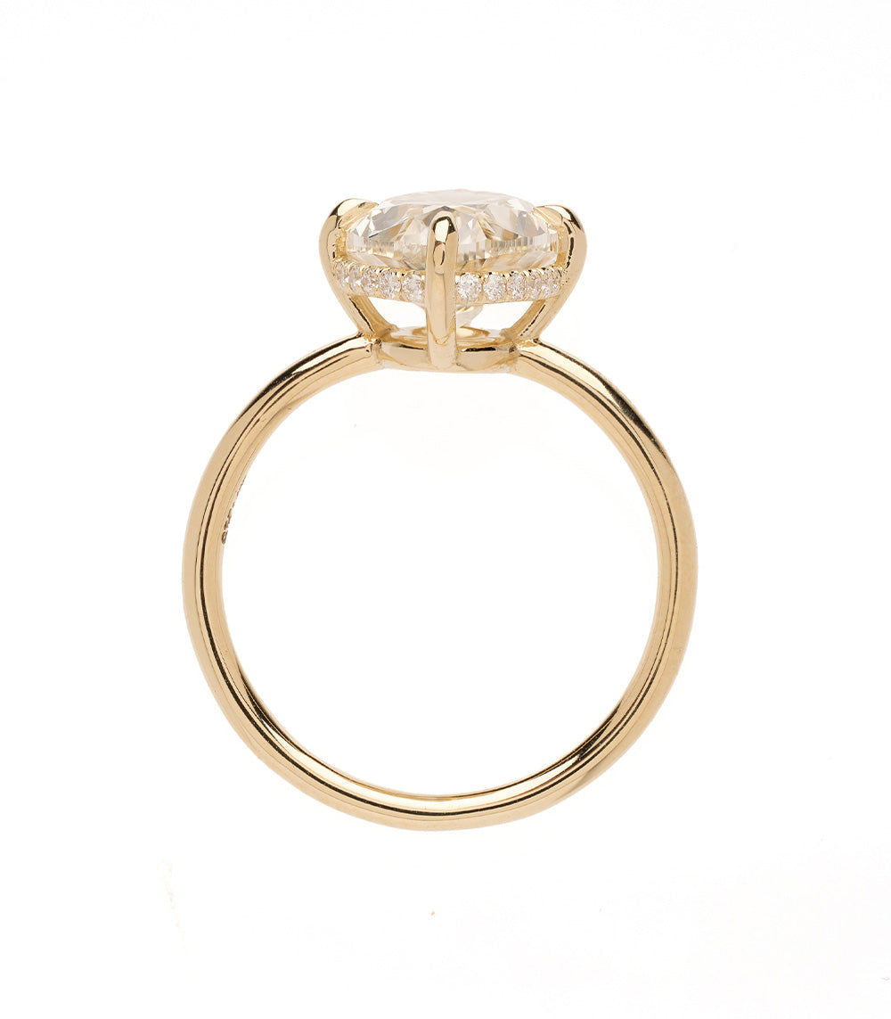 Annika by Sofia Kaman unique engagement ring in polished gold with oval center stone and halo sparkle