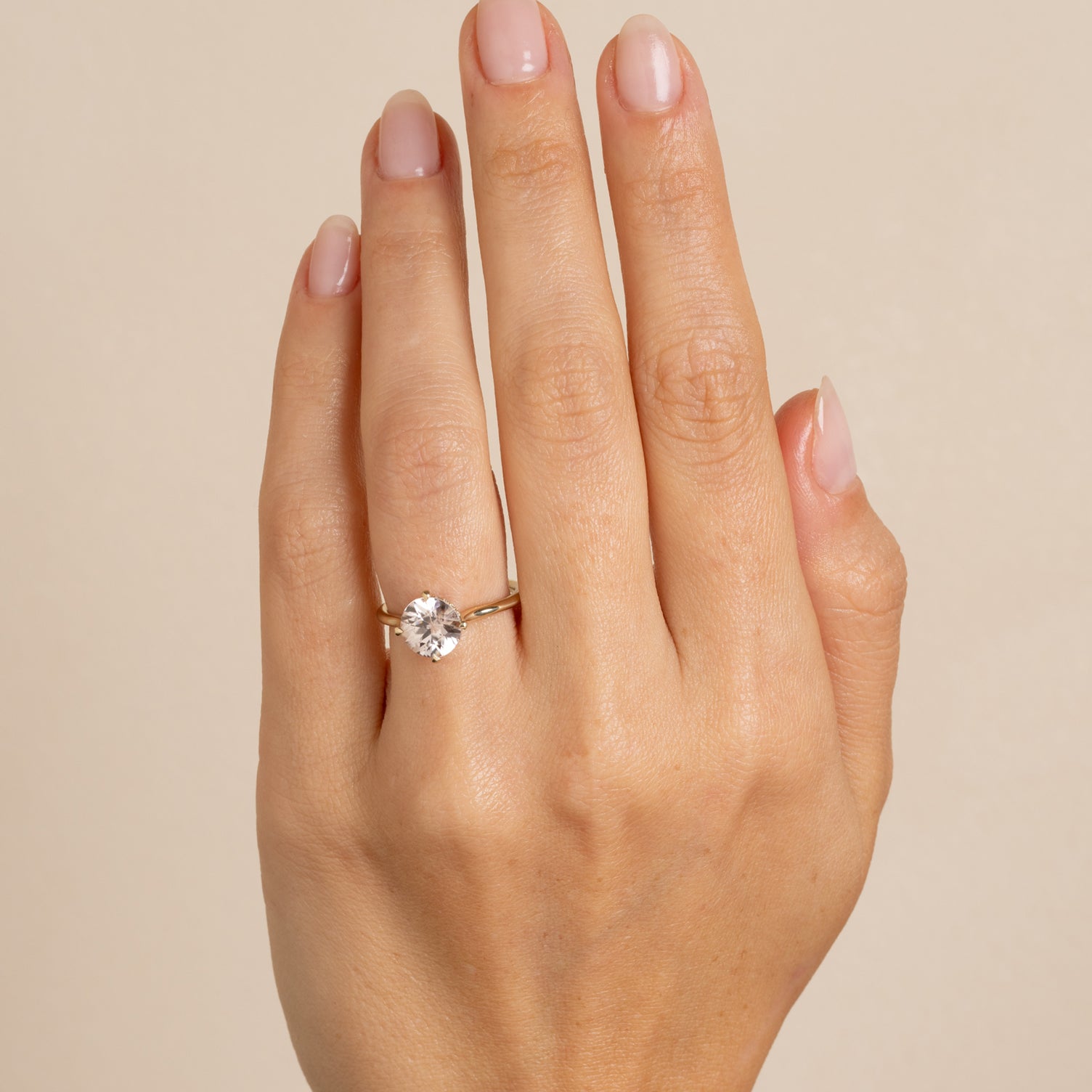 Billie SK-R94-ZIR-RB unique engagement ring gold solitaire with a round diamond—understated