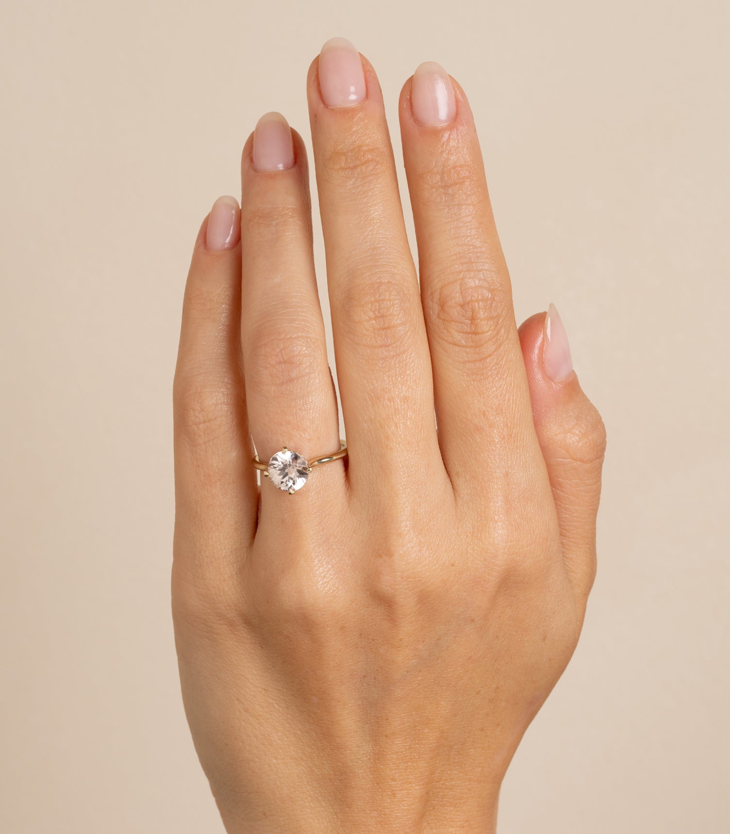 Billie SK-R94-ZIR-RB unique engagement ring gold solitaire with a round diamond—understated