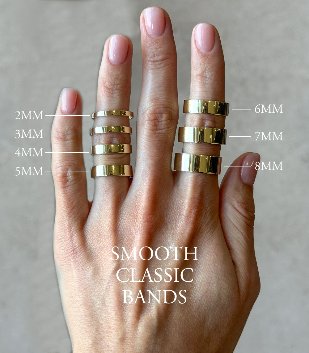 Smooth Classic Band 8MM SB-R14 ring in shiny gold with smooth finish on hand—clear reflections