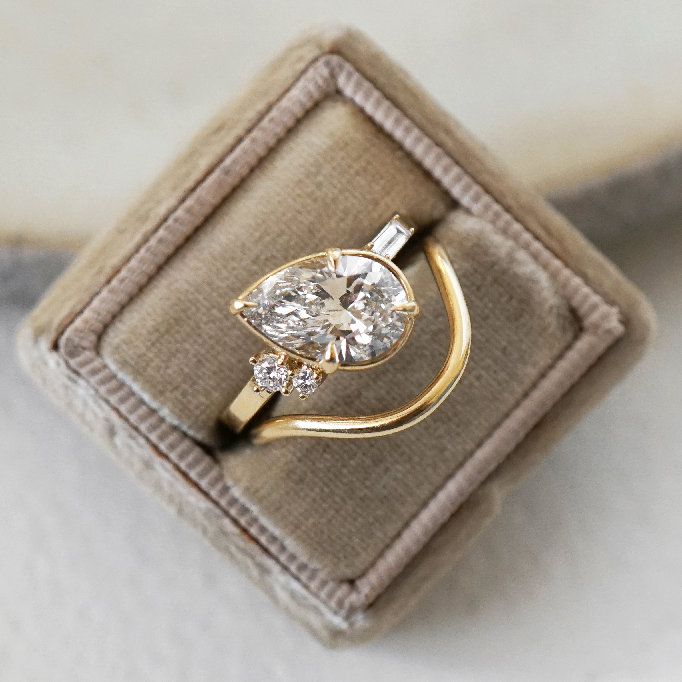 Sydney SK-R96-LGD-PS-WD-2.85 understated engagement ring in gold with asymmetrical engagement ring setting.