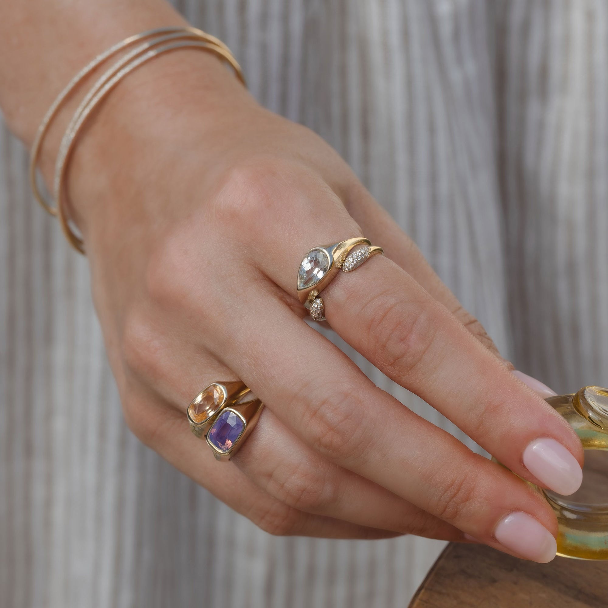 Tristan SK-R113-PC-WS-1.84 gold band with oval center stones and pave sparkle, asymmetrical design
