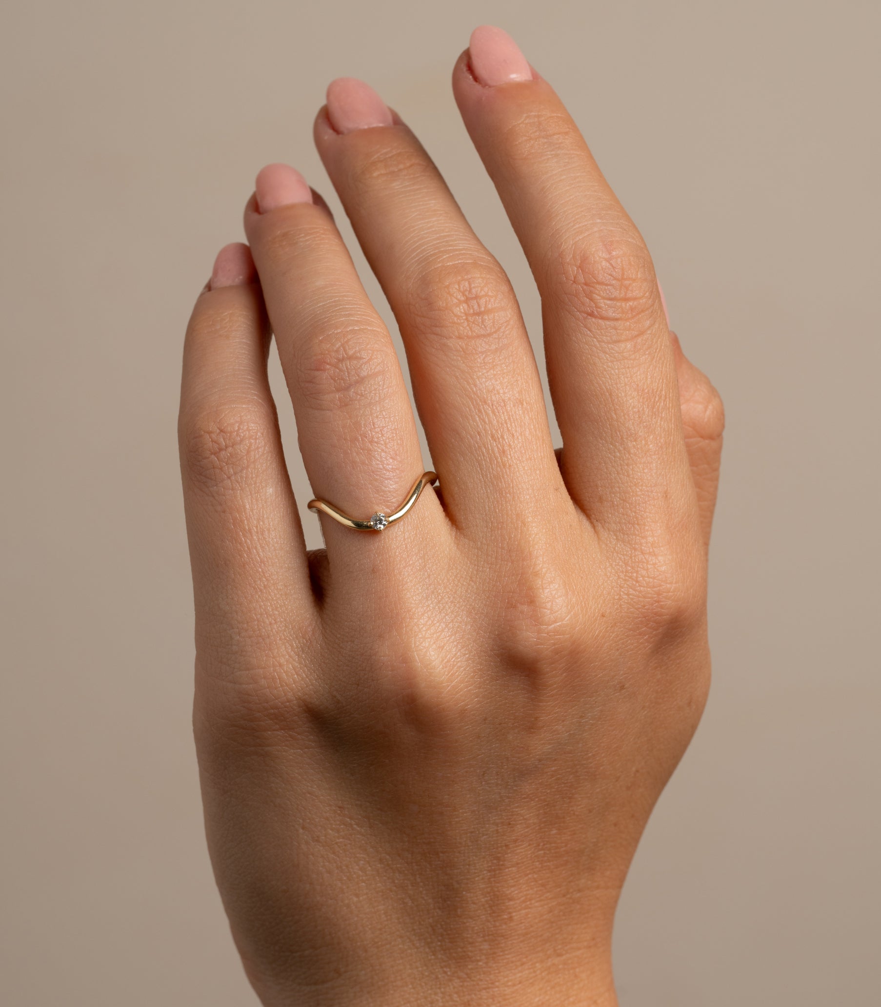 Beau Band with Round Diamond by A-R41-R, 14K yellow gold band with a small round diamond.