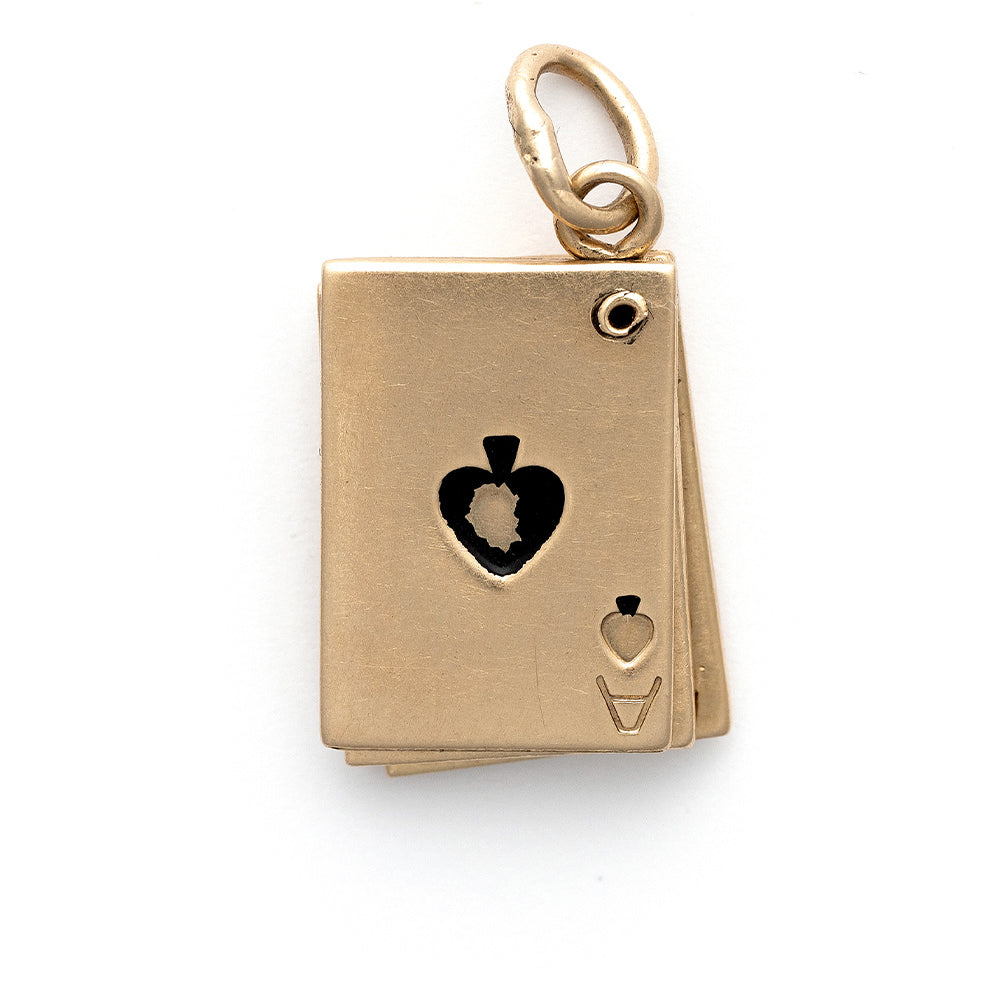 Bet On You Charm by VC-P20 gold charm with heart cutout and black enamel accents, vintage-style dangle