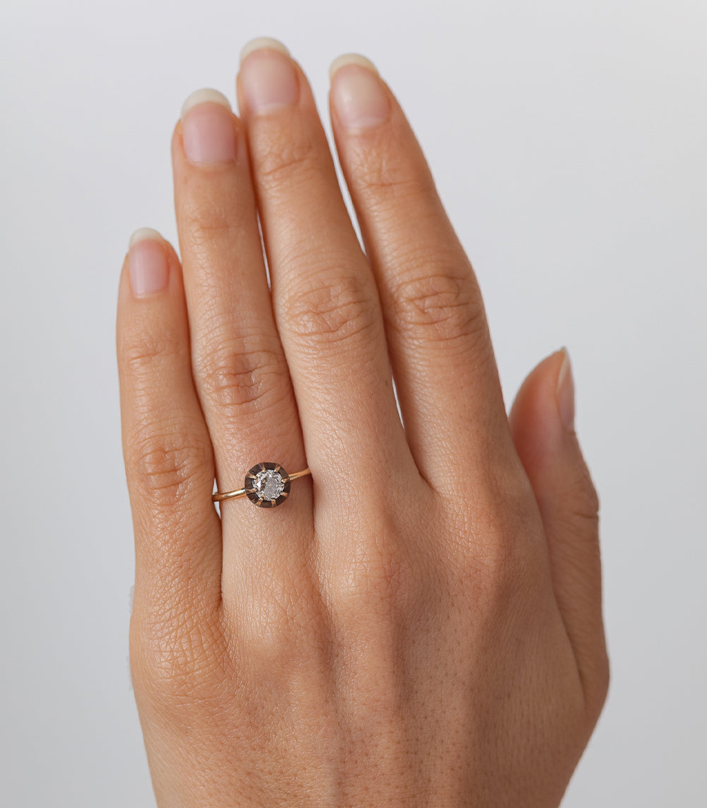 Cora SK-R28-OMC-CD-MD unique engagement ring in gold with understated round solitaire stone.