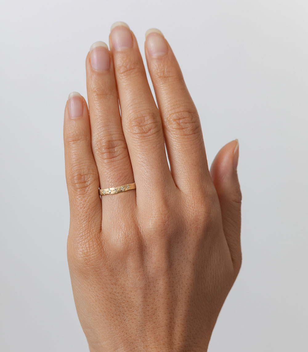 Torn Paper Band by P-R1-5Star 14K yellow gold band ring with shiny setting on hand