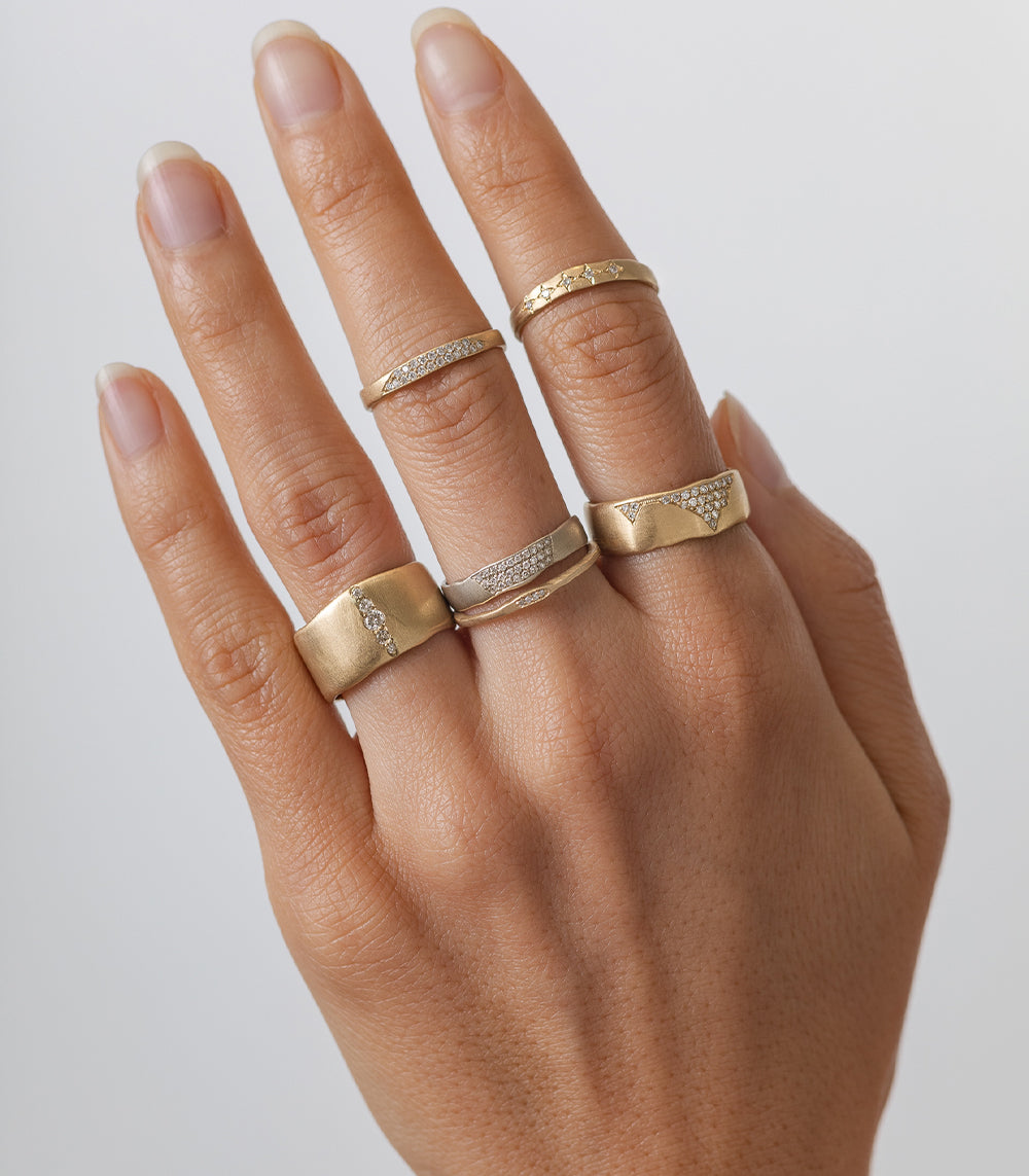 Cracked Band- 7mm by P-R3-Cracked gold ring in 14K yellow gold with cracked texture.