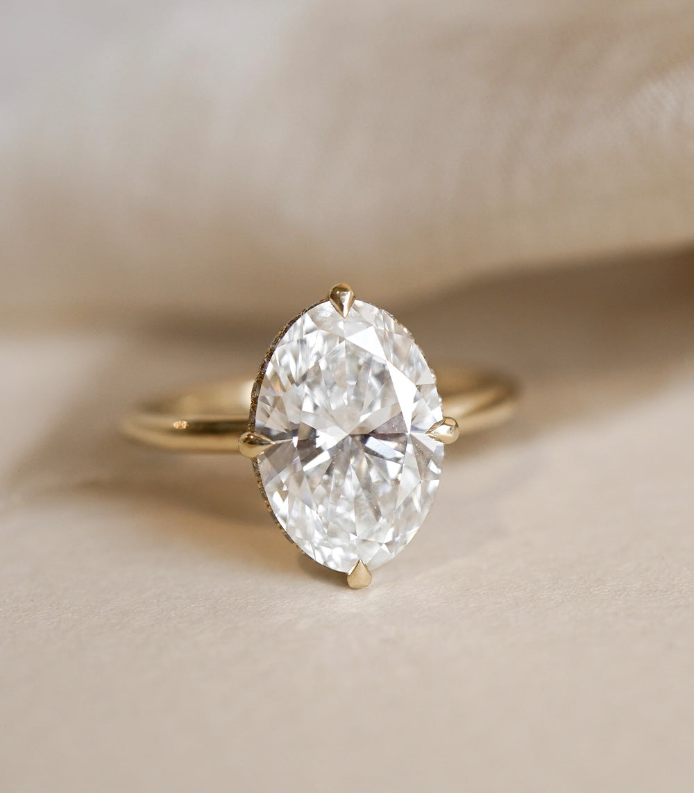 Annika by Sofia Kaman unique engagement ring in gold with large oval white diamond — understated sparkle