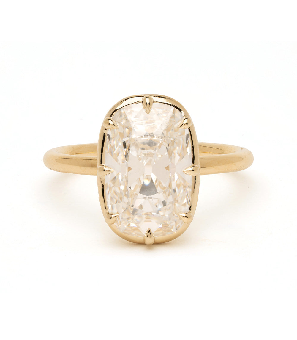 Bibi Sofia Kaman unique engagement ring in understated yellow gold with lab grown diamond cushion setting
