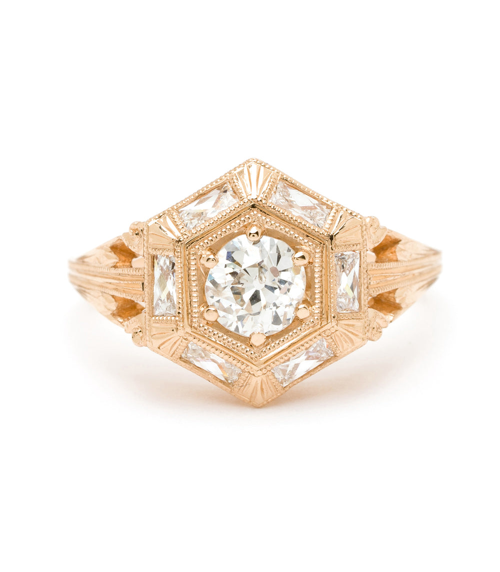 Zelda SK-R54 engagement ring in rose gold with a square halo setting and central round diamond
