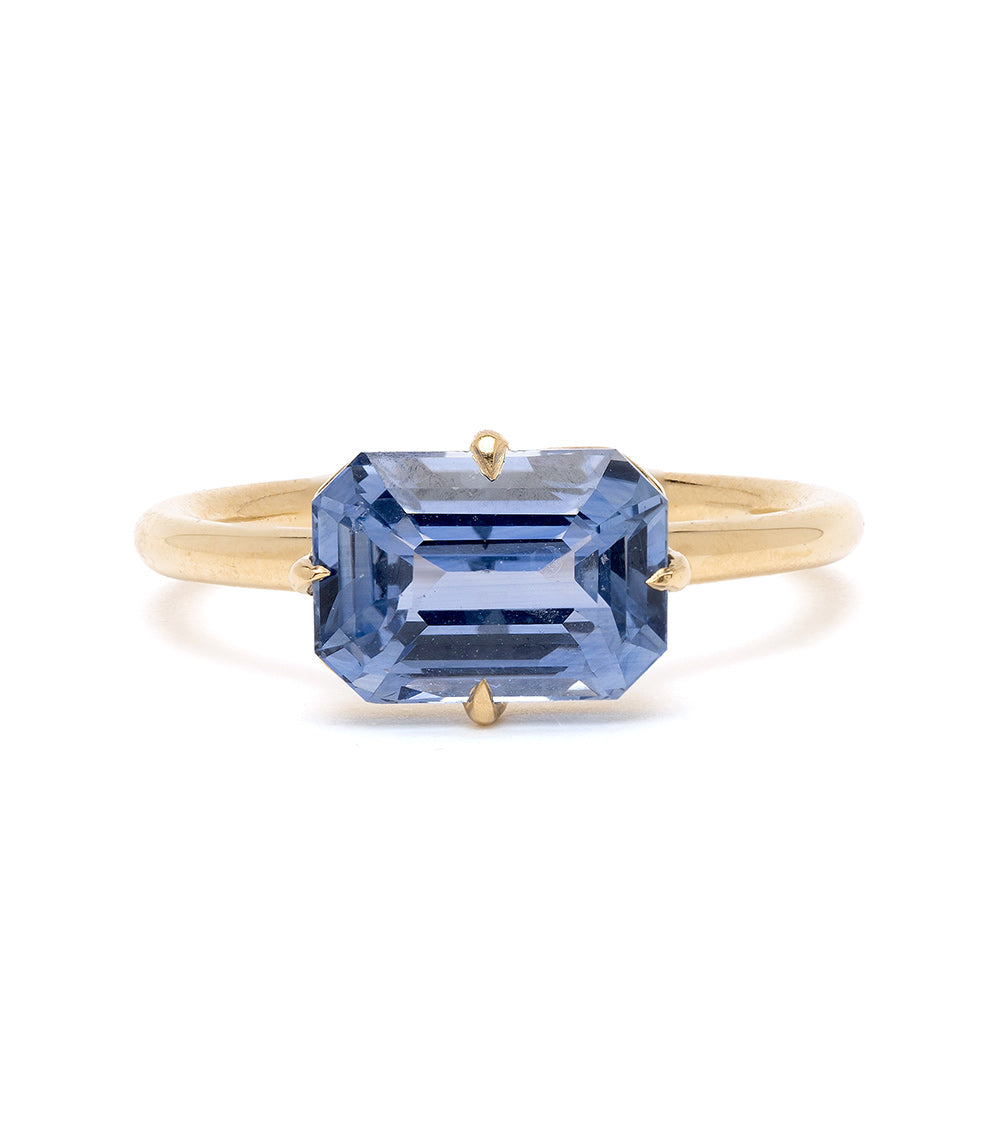 Billie SK-R94-BS-EW-EC-3.00 engagement ring in gold with a rectangular step-cut blue gemstone