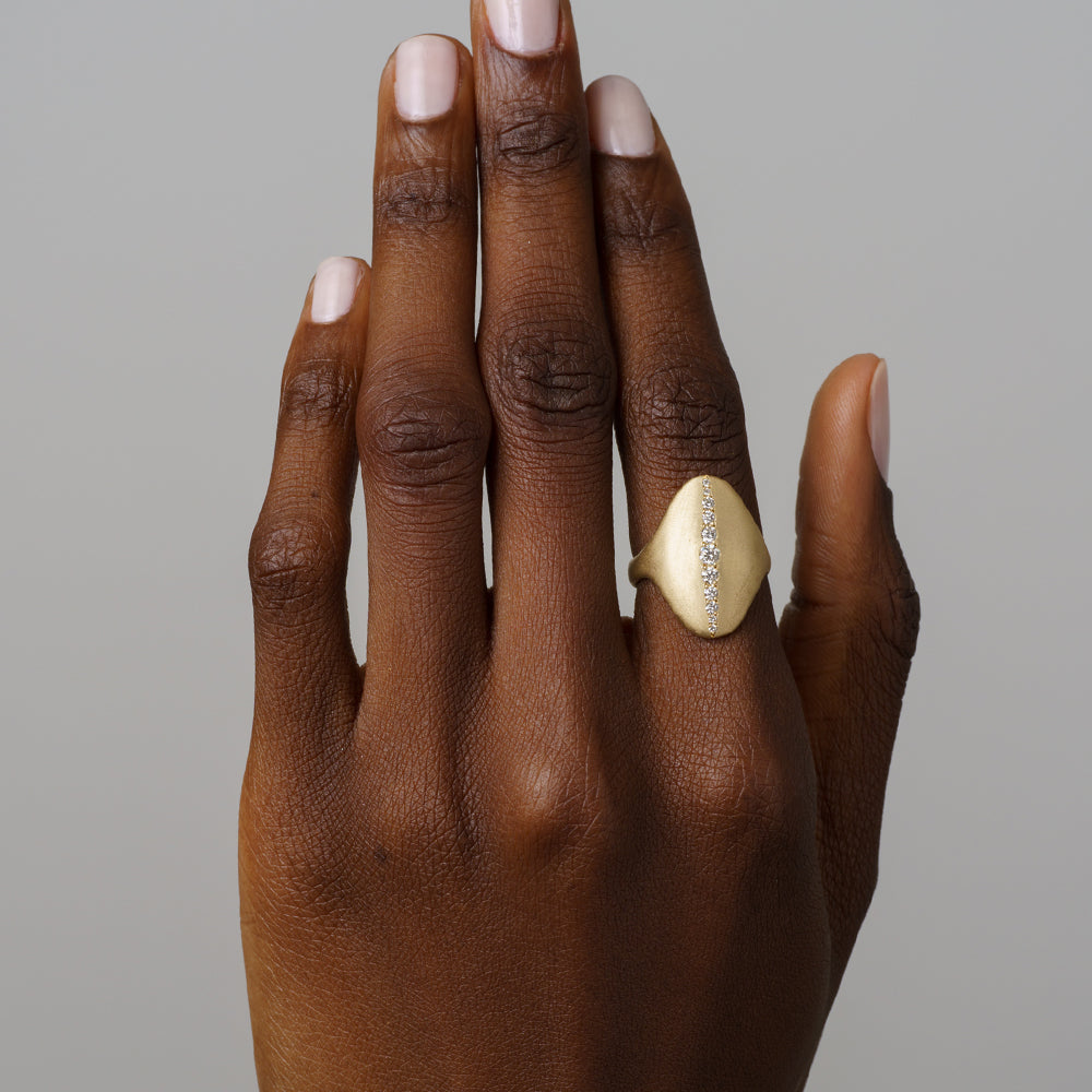 Shield Ring P-R7-D 14K yellow gold matte finish with shiny channel-set diamond stones on hand