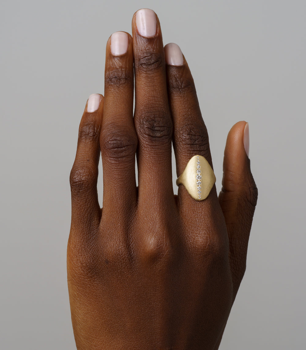 Shield Ring P-R7-D 14K yellow gold matte finish with shiny channel-set diamond stones on hand
