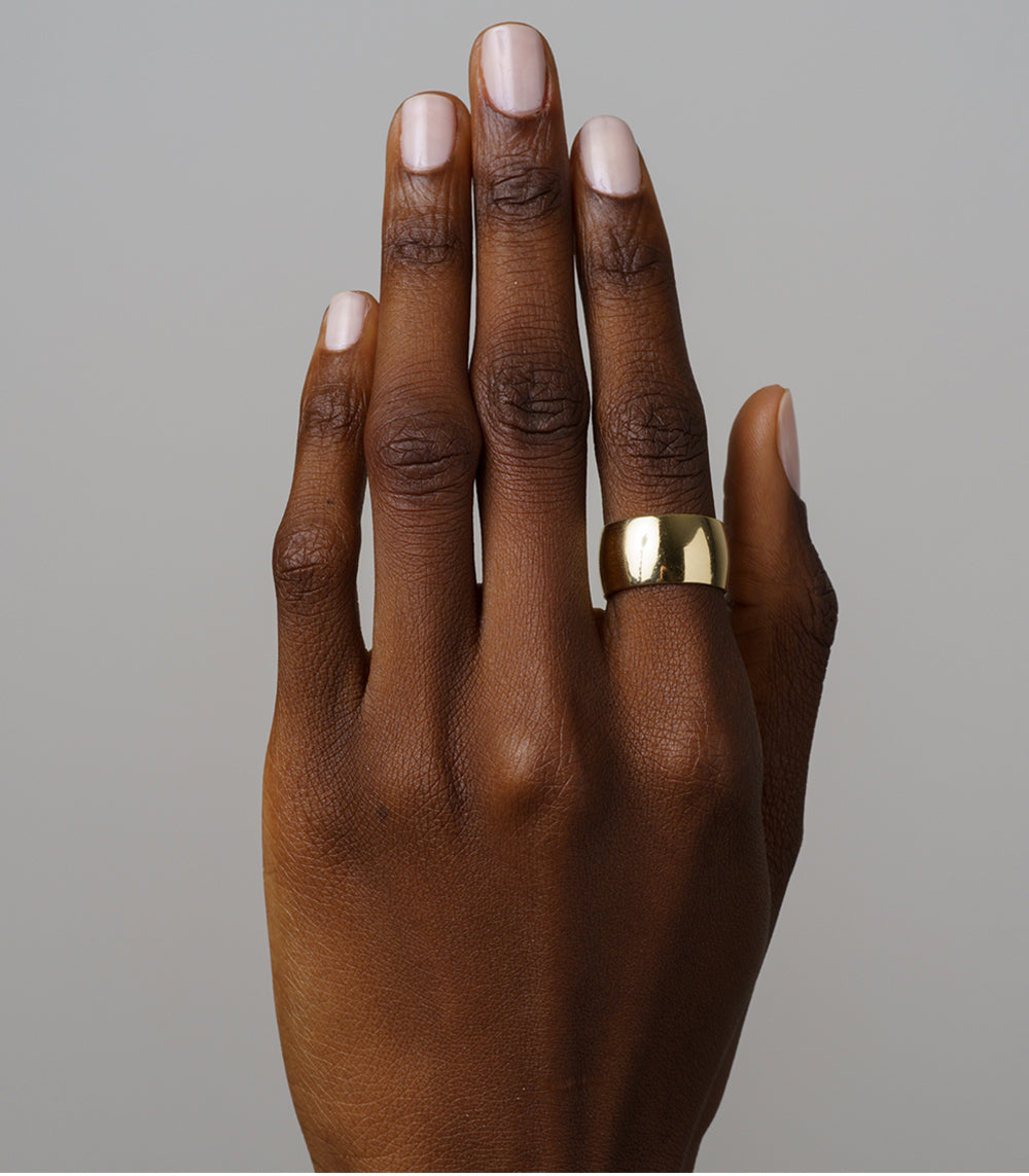 The Essential Band 11MM by EGB-R7 14K yellow gold ring band, shiny finish on finger