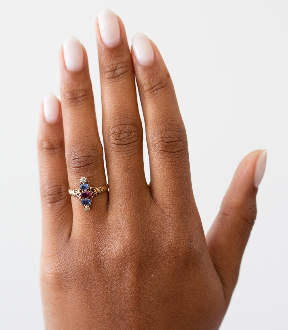 Candy Stripe VC-R187 gold engagement ring with blue center and two side stones, 3 stone engagement ring.