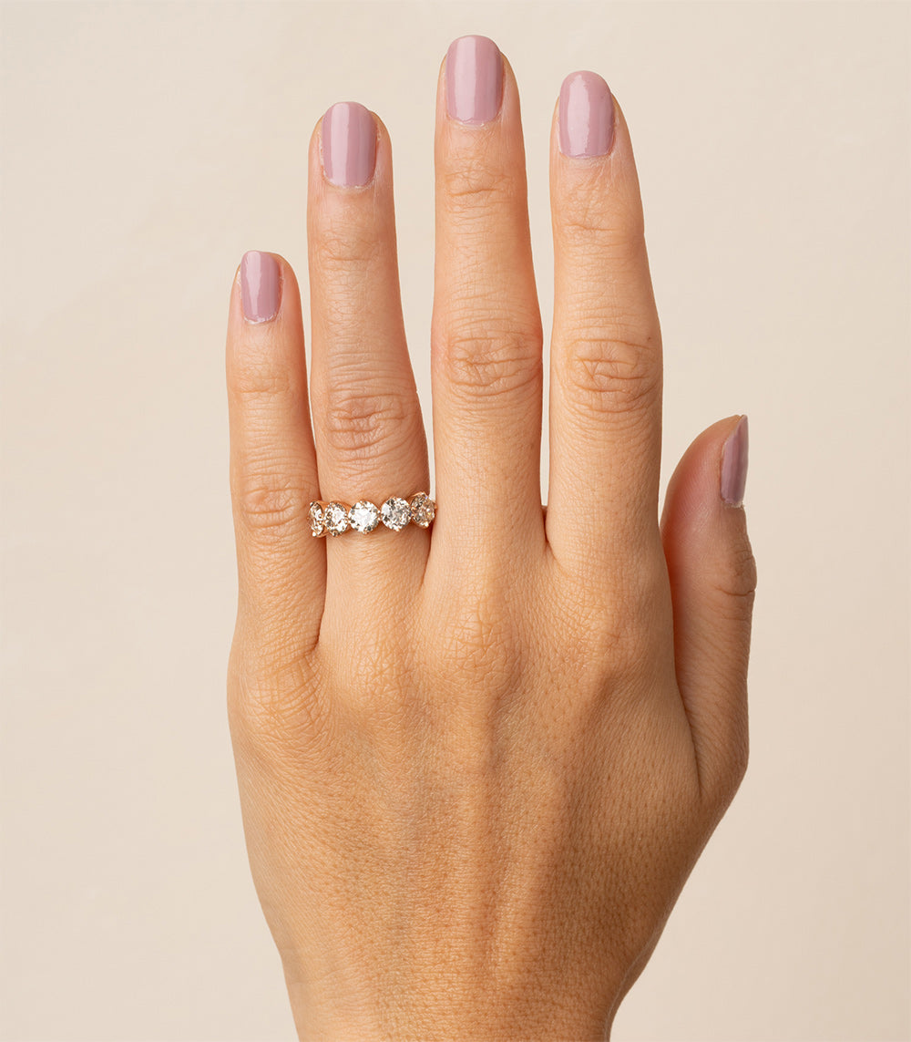 Claudette 5 Stone Band SK-R68-5-ND-OEC-CD-2.58 diamond band on hand, five-stone sparkle.